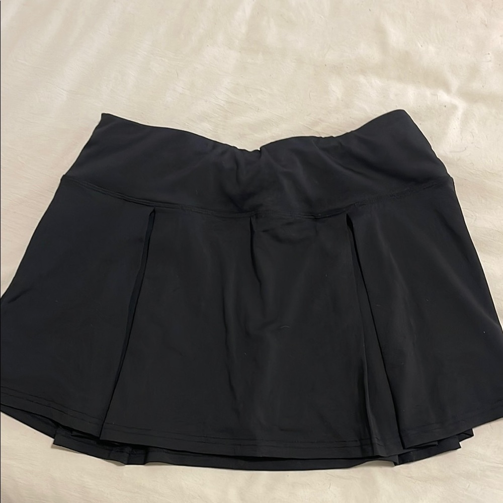 Pleated tennis skort with pockets